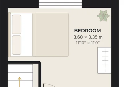 Sample floor plan with furniture graphics in the living room and bedrooms